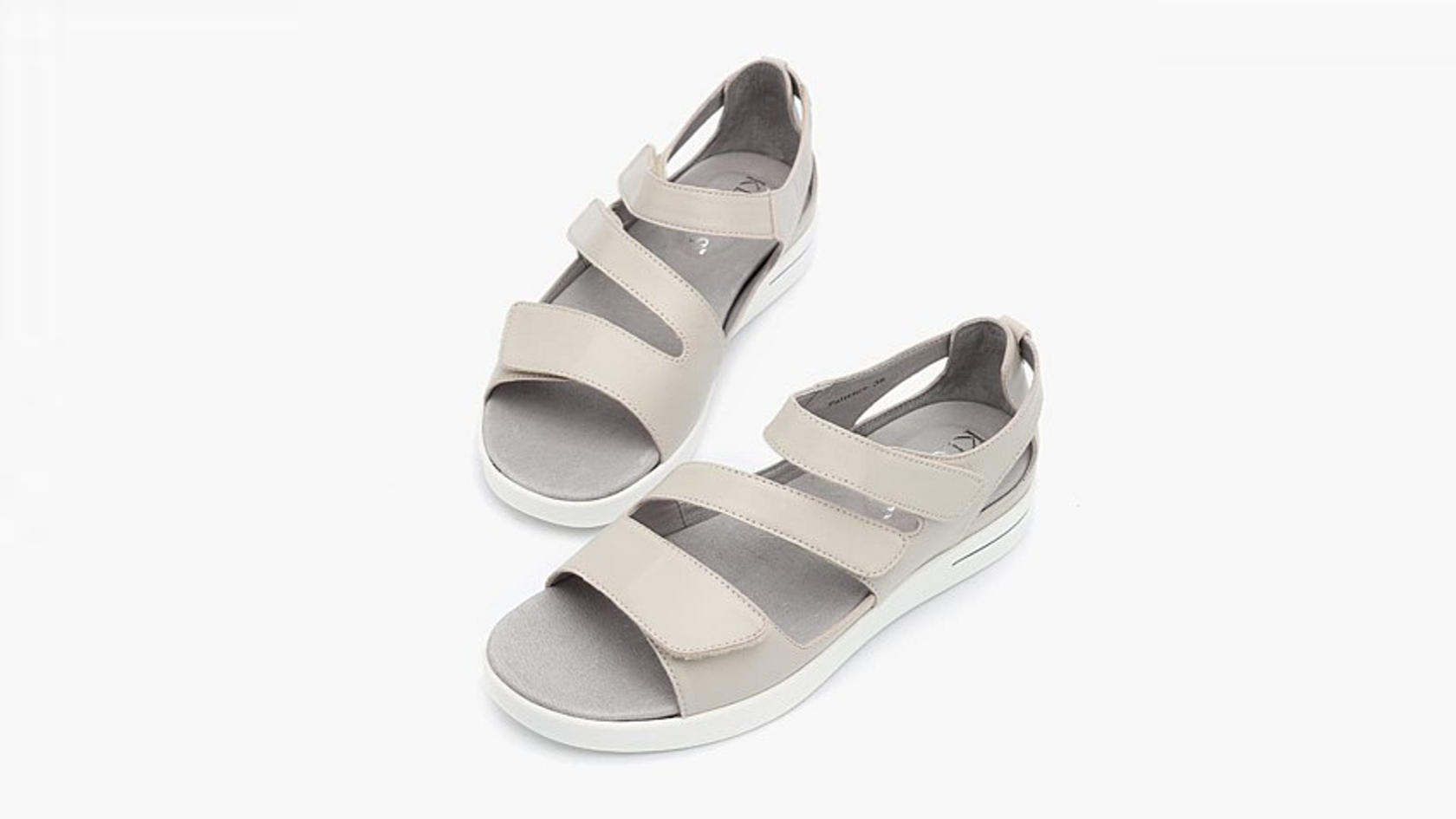 Pair of Taupe Patience sandals on a white background